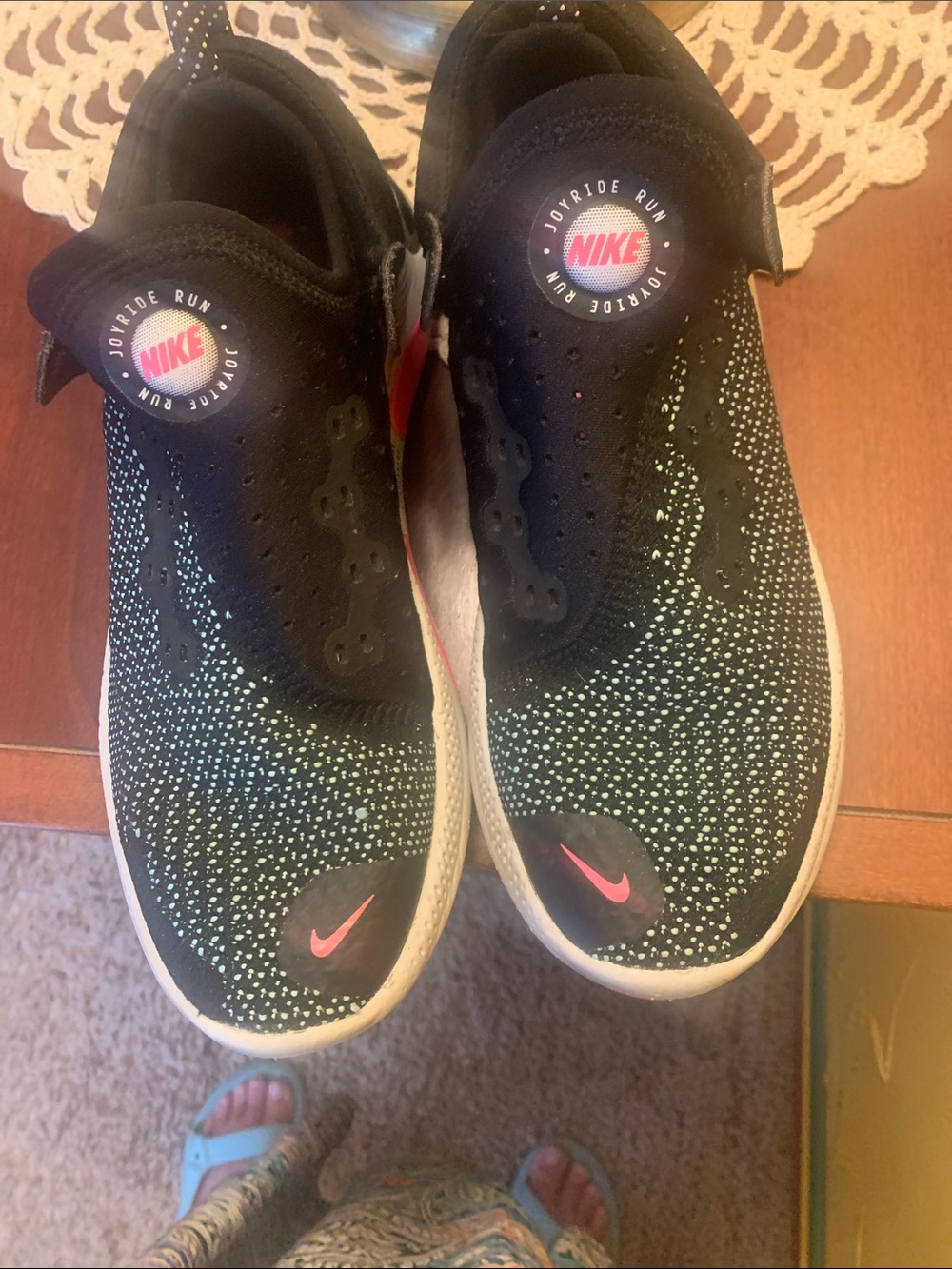 Nike women’s Black Knit Slip-On Sneakers with Mint Speckle and Pink Swoosh